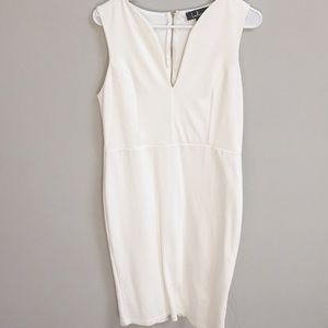 Cream/white form fitting dress with gold zipper